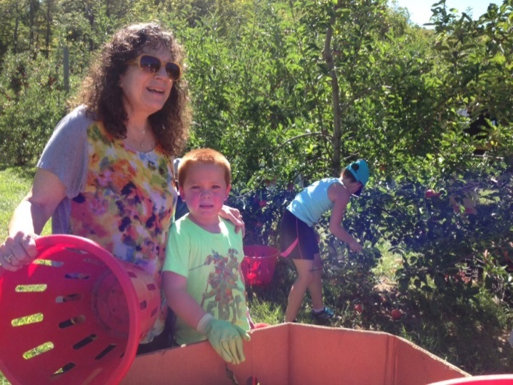 Anne Gorman and her grandson at last year’s America’s Grow-a-Row Harvest Day.